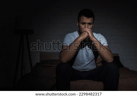 Similar – Image, Stock Photo sad depressed man alone and lonely huddled on the floor