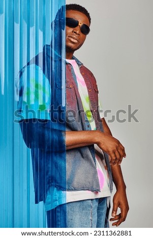 Similar – Image, Stock Photo Trendy black man on smartphone in city