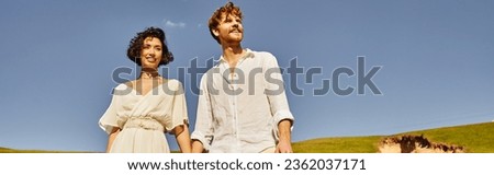 Similar – Image, Stock Photo Just married couple under the bride veil