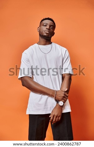 Similar – Image, Stock Photo Black man in trendy outfit near bicycle in city