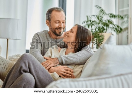 Image, Stock Photo Loving couple embracing on coastline