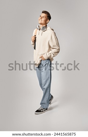 Similar – Image, Stock Photo Young man in urban environment smiles into the camera