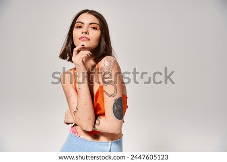 Similar – Image, Stock Photo Stylish tattooed woman on street