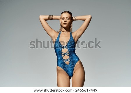 Similar – Image, Stock Photo Appealing female in swimsuit posturing on beach