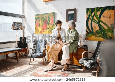 Similar – Image, Stock Photo lesbian couple painting the room walls with white color. Do it yourself and new home concept