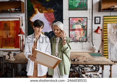 Similar – Image, Stock Photo lesbian couple painting the room walls with white color. Do it yourself and new home concept