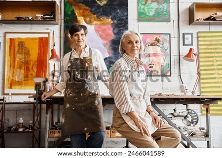 Similar – Image, Stock Photo lesbian couple painting the room walls with white color. Do it yourself and new home concept