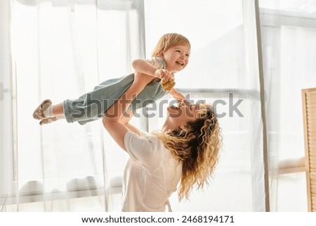 Similar – Image, Stock Photo Family mother and her daughters standing in a street downtown wearing the face masks to avoid virus infection