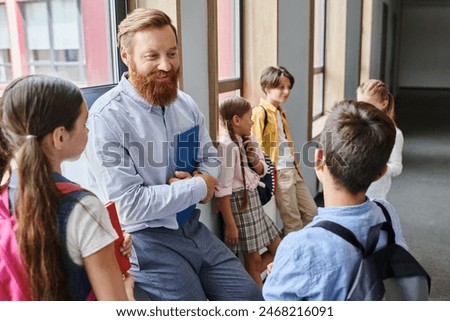 Similar – Image, Stock Photo Bearded man listening to music in headphones