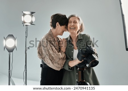 Similar – Image, Stock Photo Happy middle aged lesbian couple hugging outdoors