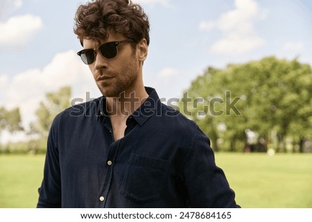 Similar – Image, Stock Photo Trendy man in sunglasses against blue wall