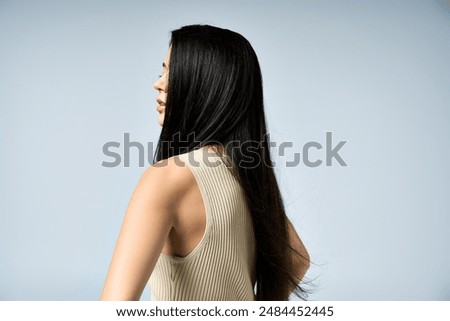 Similar – Image, Stock Photo young long haired woman holding a basket ball against green wall