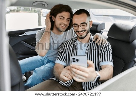 Similar – Image, Stock Photo Gay couple spending time together.