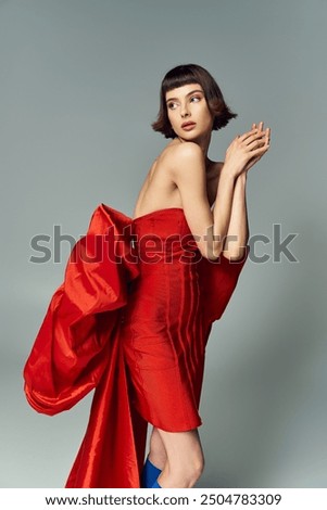 Similar – Image, Stock Photo Elegant woman in dress on brown background