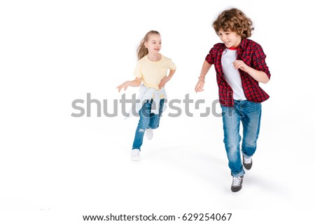 Similar – Image, Stock Photo Two children playing with their mobile on the beach