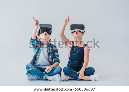 Similar – Image, Stock Photo Astonished boy with 3D glasses and popcorn