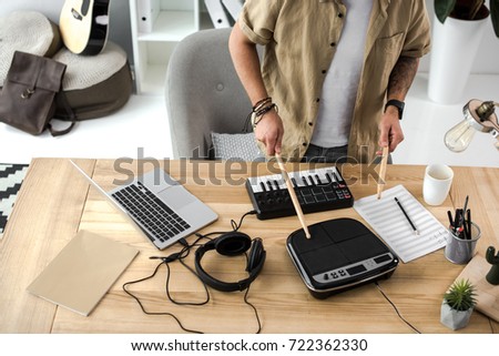 cropped shot of musician playing on drum pad with sticks Zdjęcia stock © 