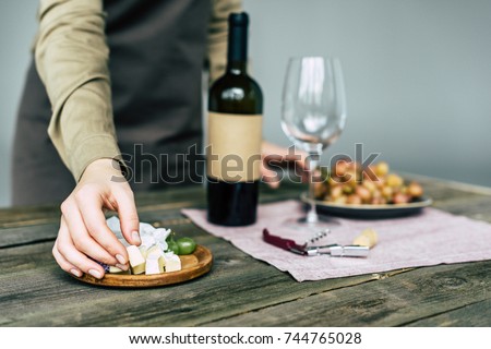 Similar – Image, Stock Photo Crop person taking grape juice in glass