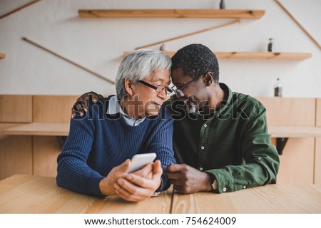 Similar – Image, Stock Photo Gay couple spending time together.