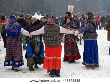 MOSCOW, RUSSIA - FEB 14: Participants at traditional round dance game at Russian pancake week on February 14, 2010 in Moscow, Russia. Pancake week is a Russian religious and folk holiday.