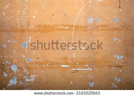 Structure of an old, dilapidated wall with holes. Dilapidated building facade with damaged plaster. Photo stock © 