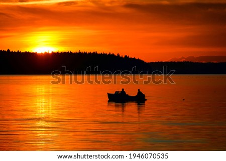 Sunset lake boat fishing scene. Fishermen boat sunset fishing. Sunset lake fishing