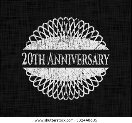 20th Anniversary chalkboard emblem written on a blackboard