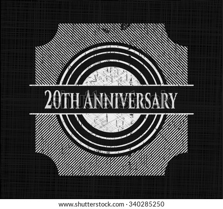 20th Anniversary chalkboard emblem written on a blackboard