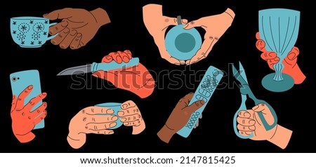 Big set of Colorful Hands holding stuff. Different gestures. Hands with cup, demitasse, scissors, mobile phone, wine glass, knife, TV remote. Hand drawn vector illustration isolated on black background