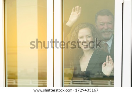 Similar – Image, Stock Photo Woman behind window in building near trees