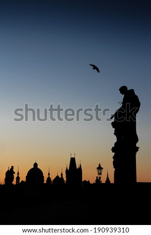 Silhouette of Prague old town as seen from the charles bridge