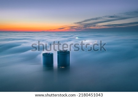 Similar – Foto Bild Wolkenkratzer mit Wolken