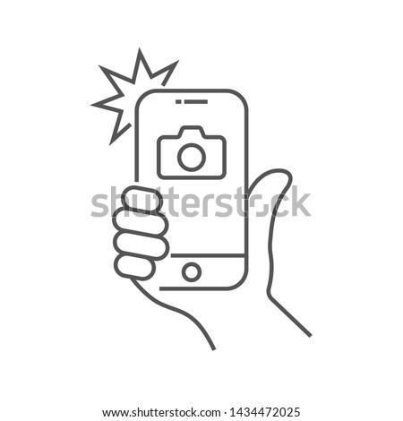 Photo on smartphone with flash, hand is holding smartphone and doing photo. Camera viewfinder, hand and flash. Editable Stroke. EPS 10