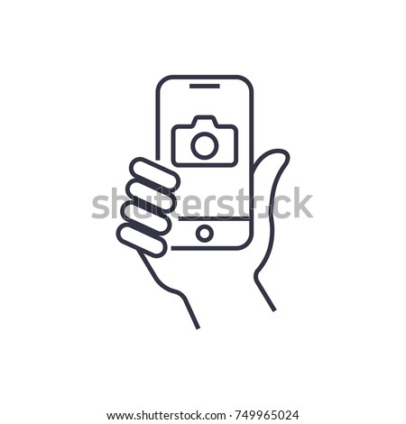 Taking selfie on smartphone concept creative icon selfie label. Hand holding smartphone linear icon. Thin line illustration. Smart phone photocamera. Editable Stroke