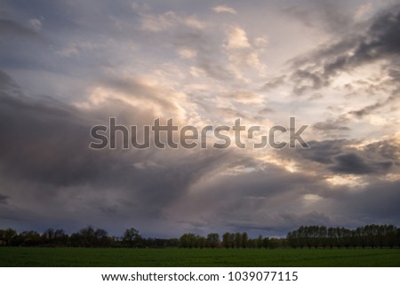 Similar – Foto Bild Der Himmel über Berlin im Abendlicht mit schönen Wolken und Fernsehtürmchen