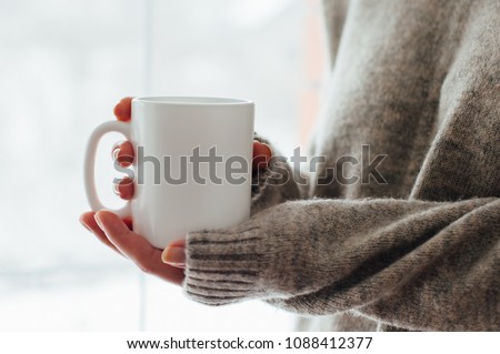 Similar – Image, Stock Photo female hands in winter gloves in a red and white striped hugging behind green Christmas tree outdoors. Christmas and New Year holiday concept