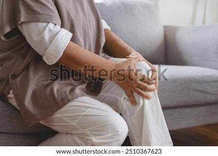 Similar – Image, Stock Photo Senior woman feeling pain while consulting doctor on her smart phone