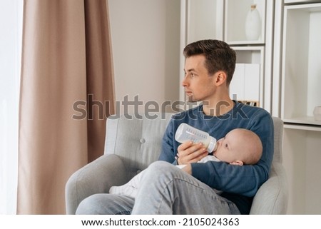 Similar – Image, Stock Photo Dad taking care of his little son at home
