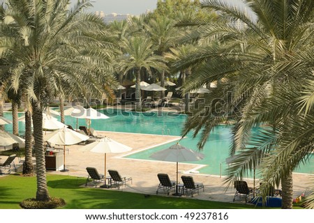 Swimming pool recreation area of luxury hotel, Dubai, United Arab Emirates