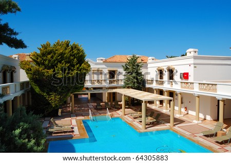 Modern luxury villas with swimming pool at luxury hotel, Crete, Greece