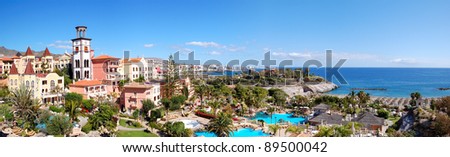 Panorama of luxury hotel and Playa de las Americas at background, Tenerife island, Spain