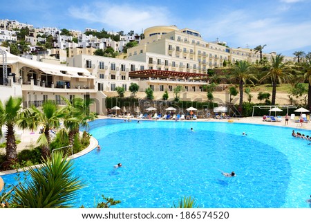 BODRUM, TURKEY - MAY 21: The tourists enjoing their vacation in luxury hotel on May 21, 2013 in Bodrum, Turkey. More then 36 mln tourists have visited Turkey in year 2013