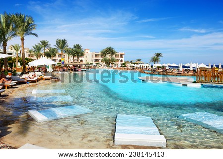 SHARM EL SHEIKH, EGYPT -  NOVEMBER 29: The tourists are on vacation at popular hotel on November 29, 2013 in Sharm el Sheikh, Egypt. Up to 12 million tourists have visited Egypt in year 2013.