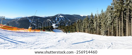 BUKOVEL, UKRAINE - FEBRUARY 17: The skiers are on a slope in Bukovel. It is the largest ski resort in Ukraine, February 17, 2015 in Bukovel, Ukraine