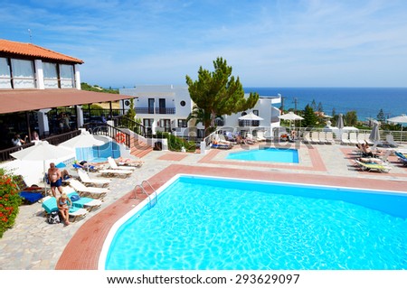 CRETE, GREECE - MAY 12: The tourists enjoying their vacation in luxury hotel on May 12, 2014 in Crete, Greece. Up to 16 mln tourists is expected to visit Greece in year 2014.