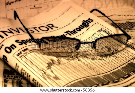 Newspaper and Glasses With Colored Lighting
