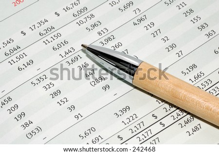 Pen and Financial Figures.