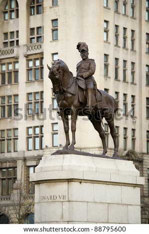 A memorial statue of King Edward VII of Britain outside the Liver Buildings, Liverpool, United Kingdom