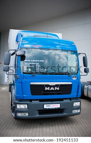 VILNIUS - MAY 9: MAN TGL 12.250 delivery truck on May 9, 2014 in Vilnius, Lithuania. MAN AG, is a German mechanical engineering company. MAN supplies trucks, buses, diesel engines and turbomachinery.