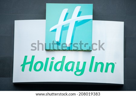 VILNIUS, LITHUANIA - JULY 10: Holiday Inn Hotel sign on July 10, 2014 in Vilnius, Lithuania. Holiday Inn is a multinational brand of hotels, part of the British InterContinental Hotels Group.